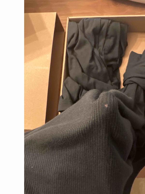 Customer photo for "came with holes in the pants"