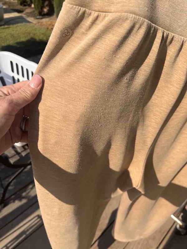 Customer photo for "First wash and they are full of pills"