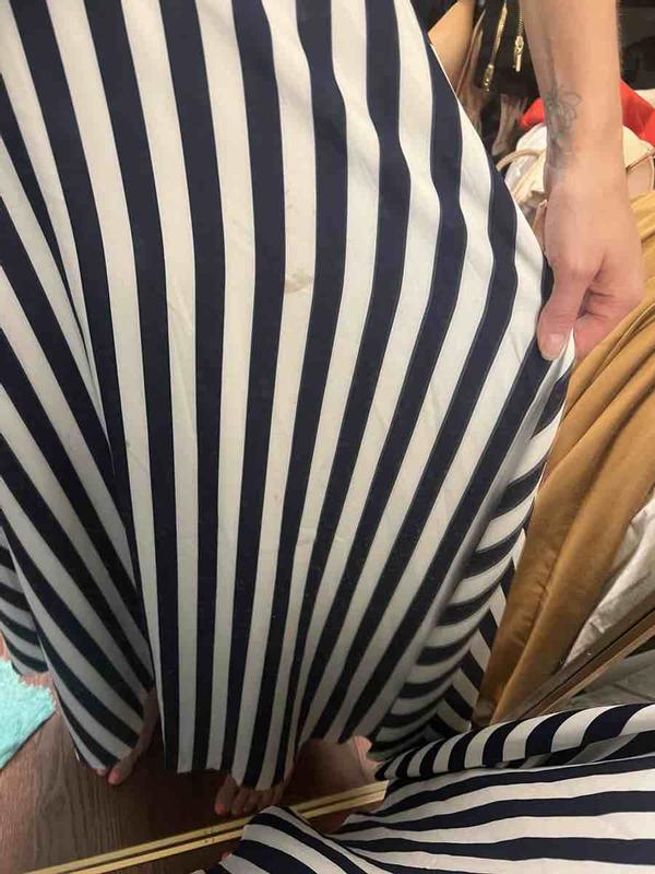 Customer photo for "Received disgusting, used, stained outfit"