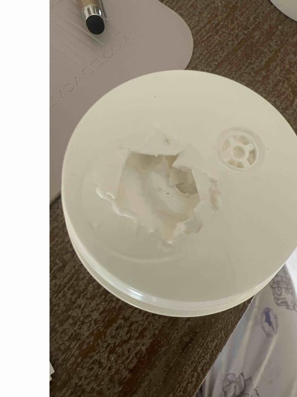 Customer photo for "horrible lid.  tried to cut it."