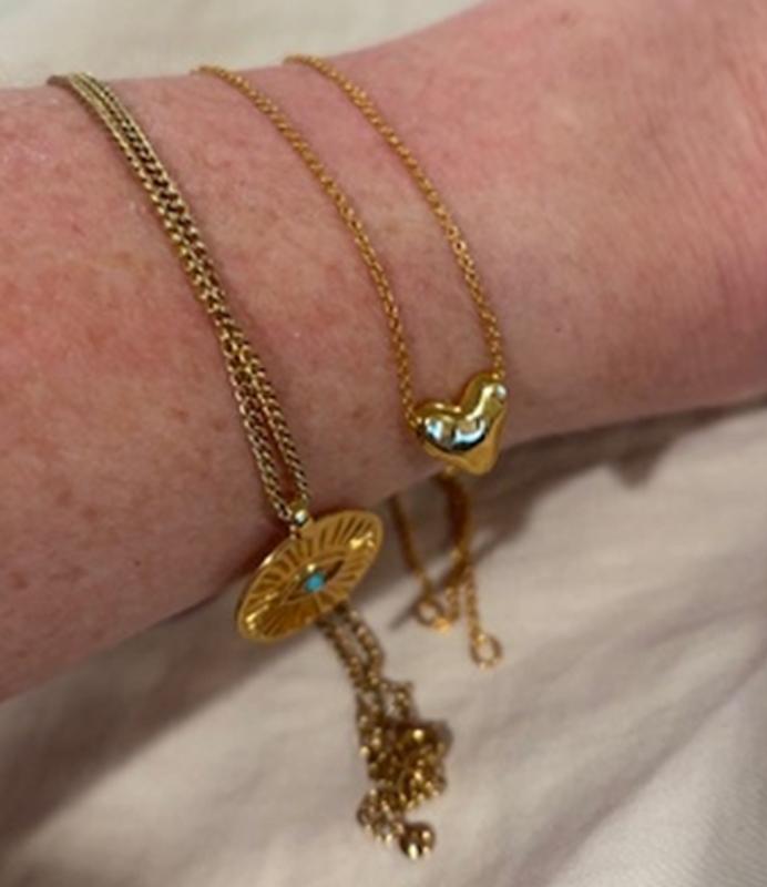 Customer photo for "Not natural gold color and tarnishes easily"