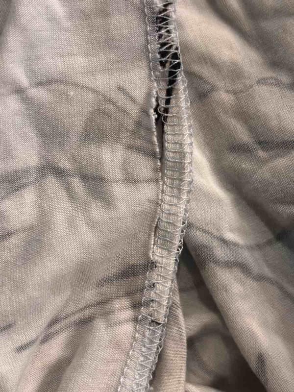 Customer photo for "pretty but sewn cheaply"