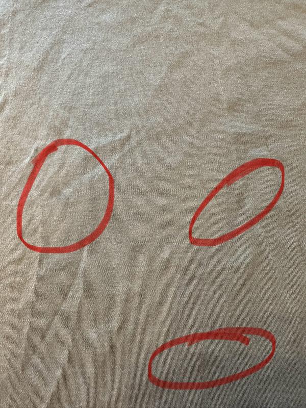Customer photo for "Received worn shirt"