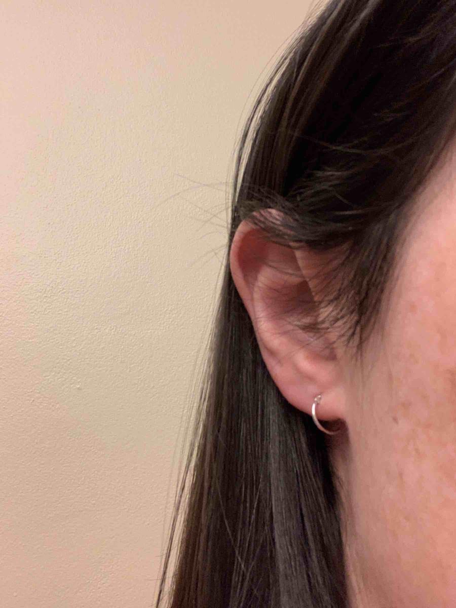 Customer photo for "Delicate mini hoops"