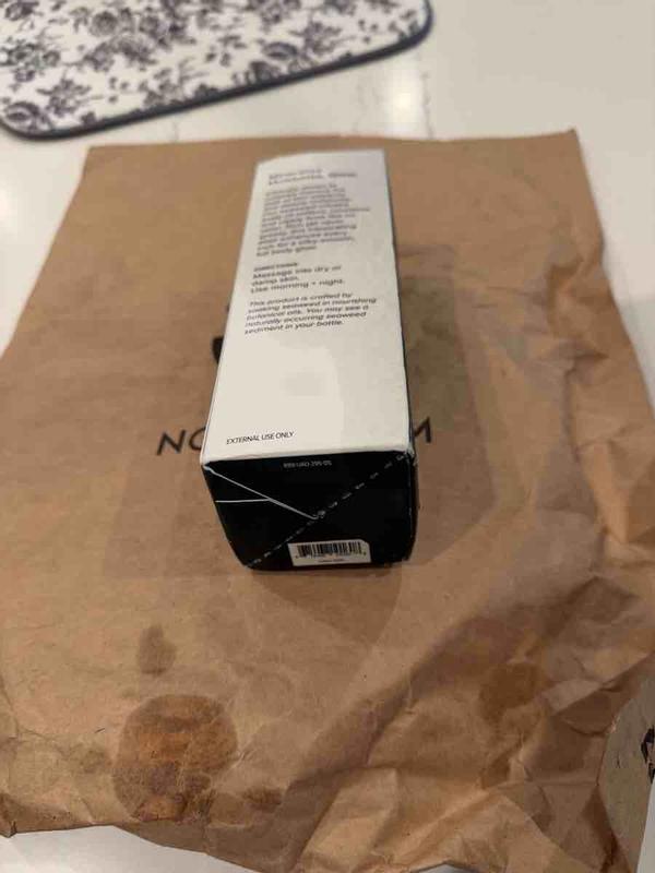 Customer photo for "shipped oil in a paper bag and oil leaked"
