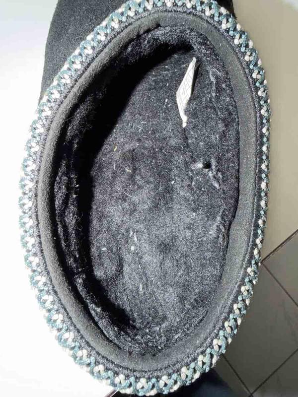 Customer photo for "Arrived worn"