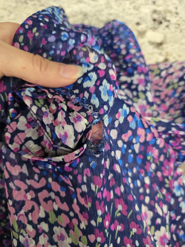 Customer photo for "Poor quality, pocket ripped out after 2nd wash"