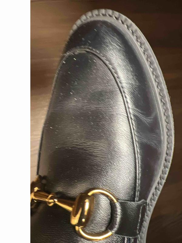 Customer photo for "good shoe but soles are not rubber"