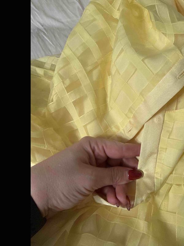 Customer photo for "two buttons missing from dress"