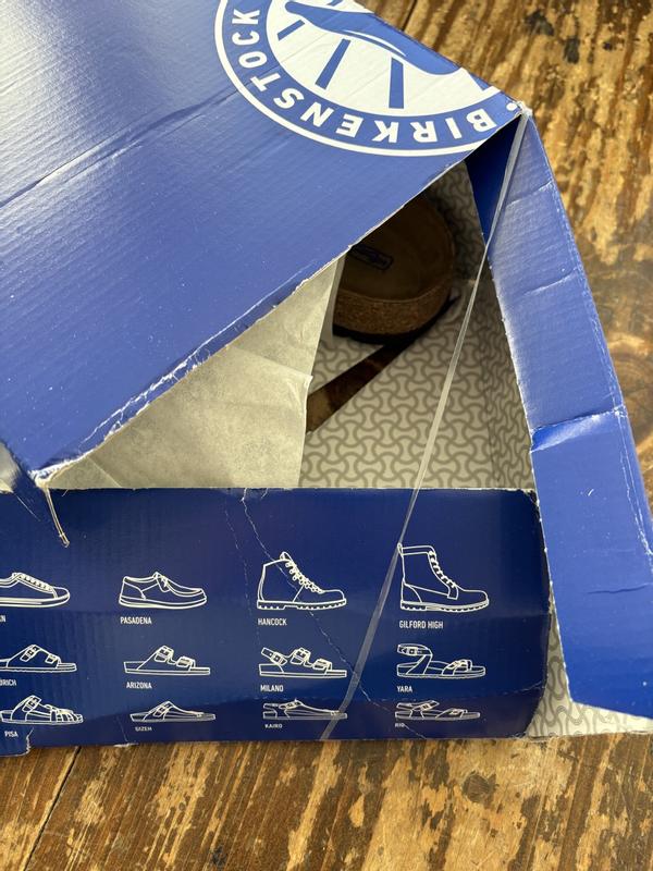 Customer photo for "Item delivered in torn up box"