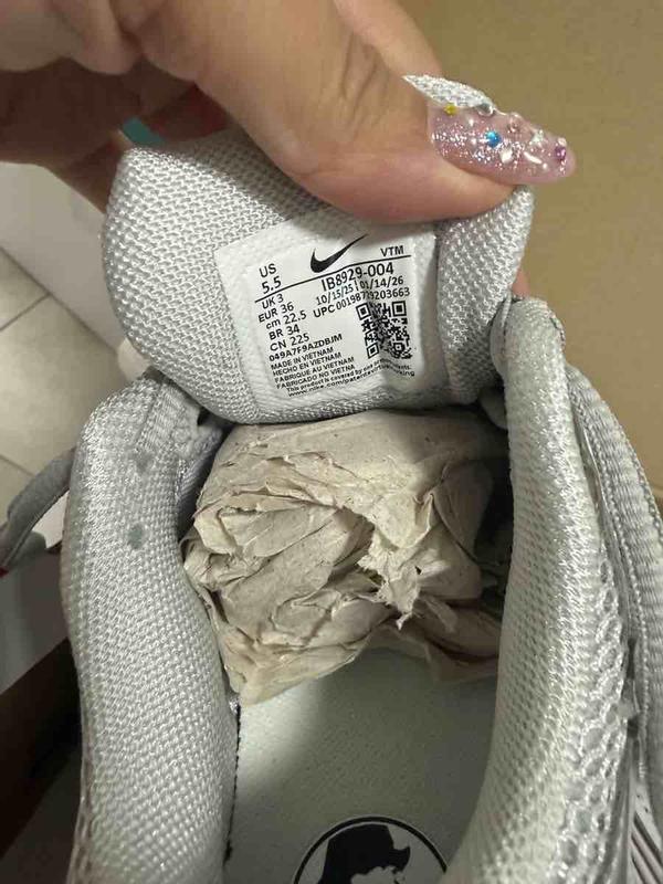 Customer photo for "RECEIVED SNEAKER WITH HOLE ON SIDE"