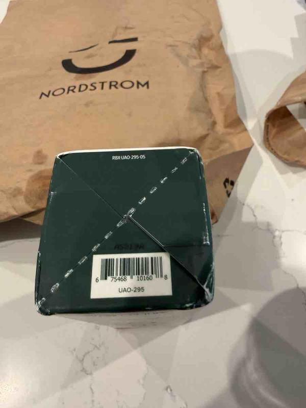 Customer photo for "shipped oil in a paper bag and oil leaked"