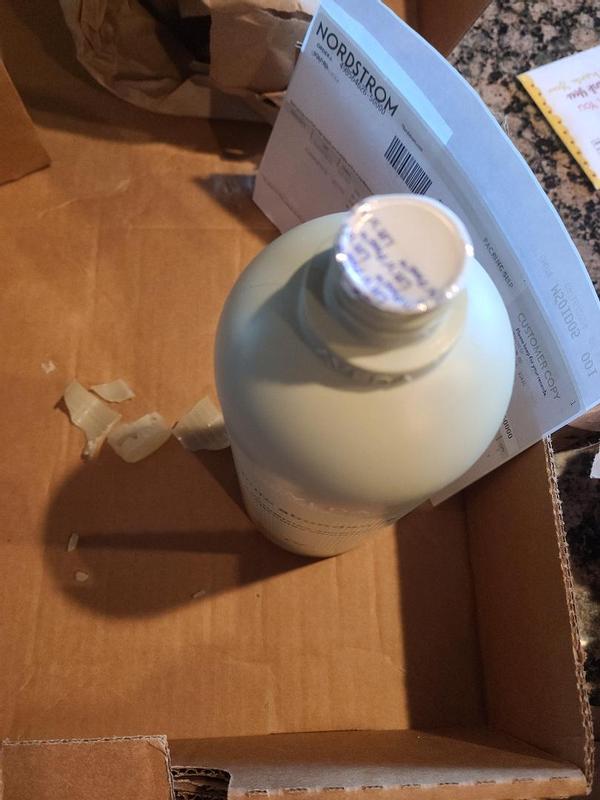 Customer photo for "The cap to one bottle totally broken off."