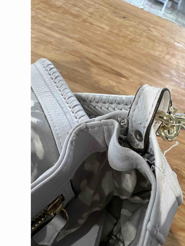Customer photo for "poorly stitched"