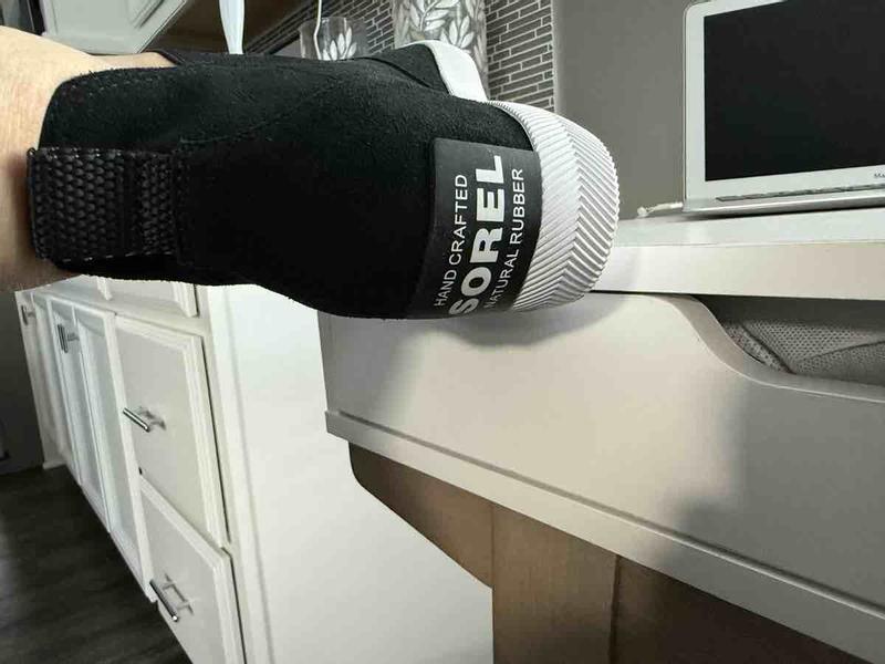 large rubber sticker on back of shoes