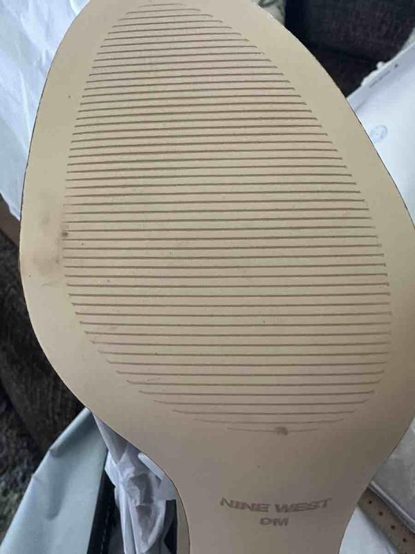Customer photo for "the box is beat up and the shoes were used."