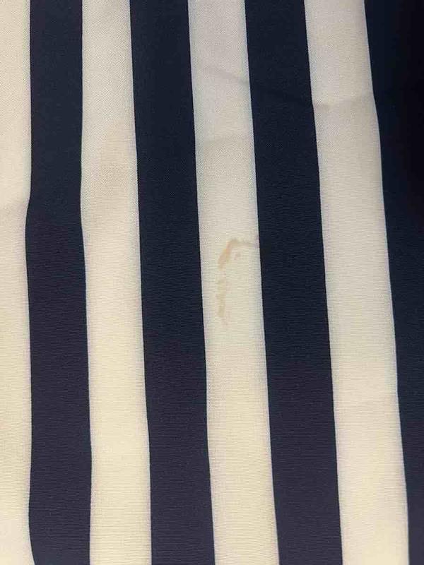 Customer photo for "Received disgusting, used, stained outfit"