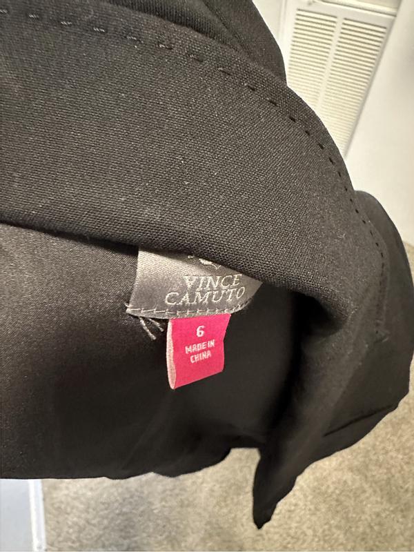 No lining, odd stitching, “stained buttons”