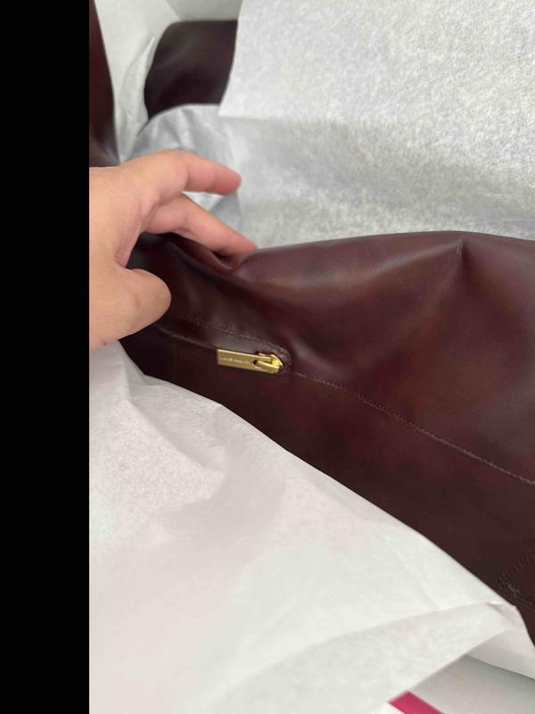 Beautiful color. Cheap material.