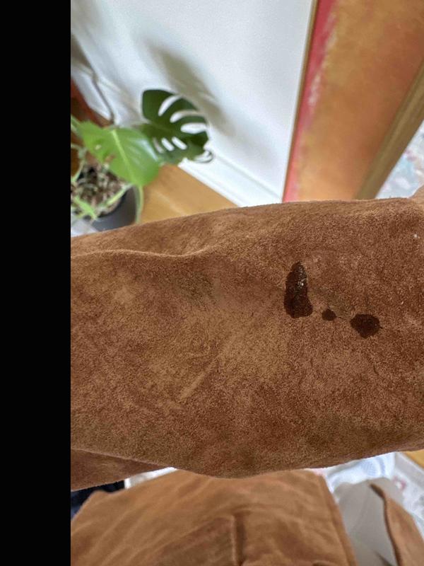 Customer photo for "weird stains on jacket"