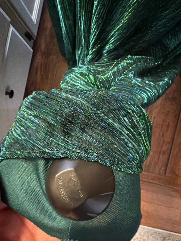 Customer photo for "Shipped with security tag still attached"