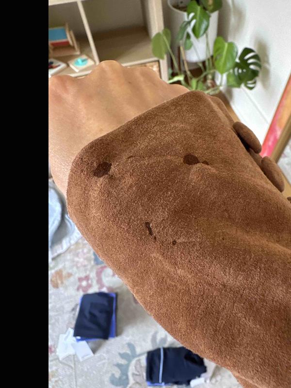 Customer photo for "weird stains on jacket"