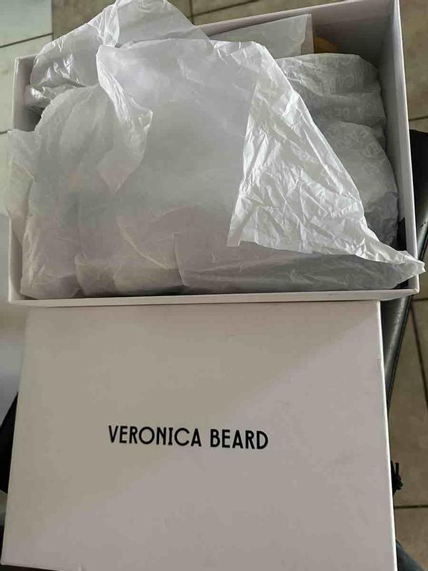 Customer photo for "beautiful used sneakers"