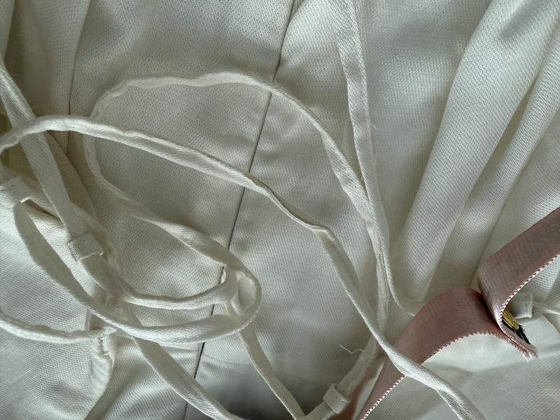 Customer photo for "Dirty item received and sizing way off"
