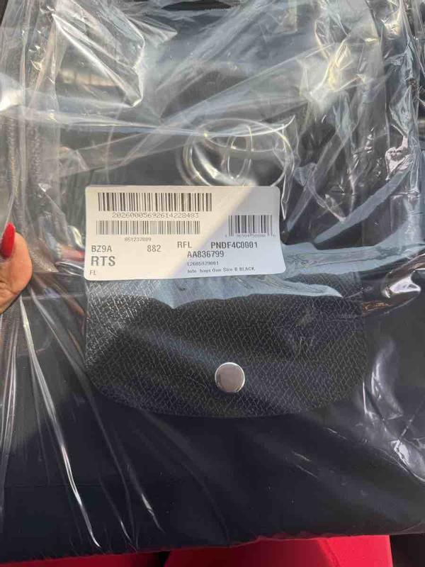Customer photo for "Sent a Fake Longchamp"