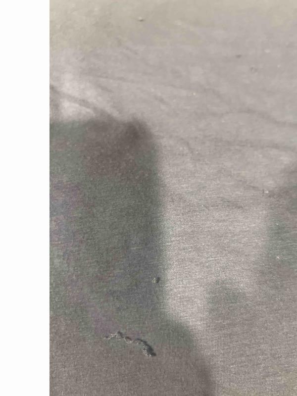 Customer photo for "Already has pulls after one wash"