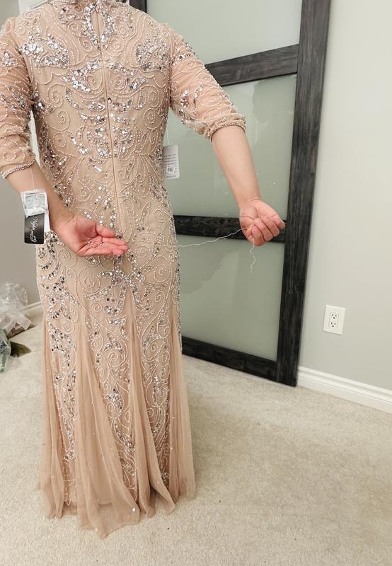 Customer photo for "Received a Used/Returned Defective Dress"