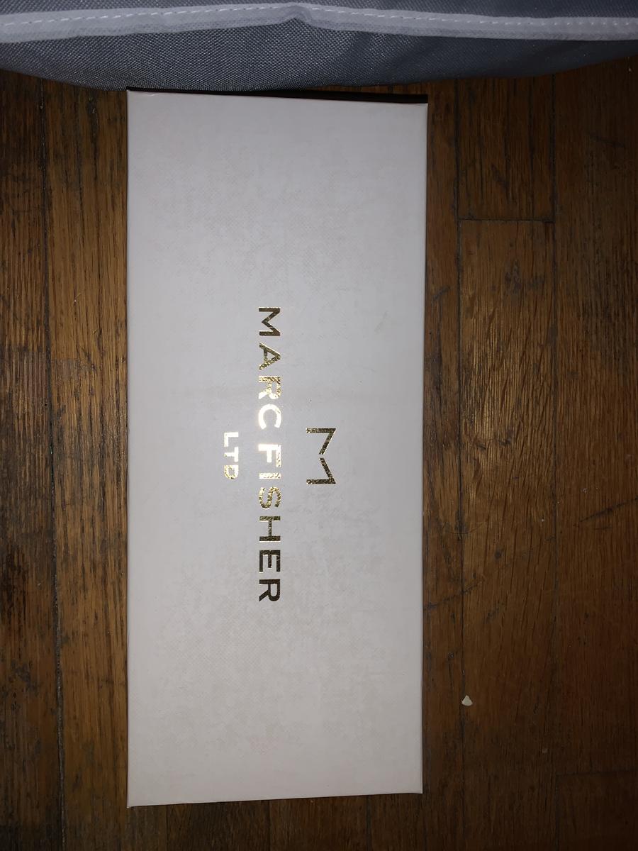 Customer photo for "Long shipping. Great Shoe. Fits slightly large"