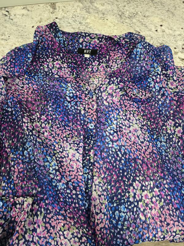 Customer photo for "Poor quality, pocket ripped out after 2nd wash"