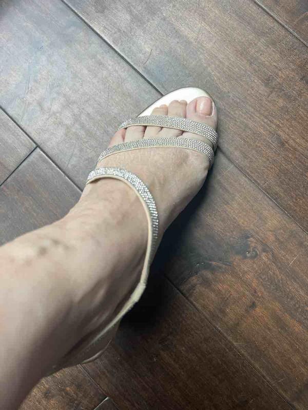 Customer photo for "Beautiful sandal but strap is loose"