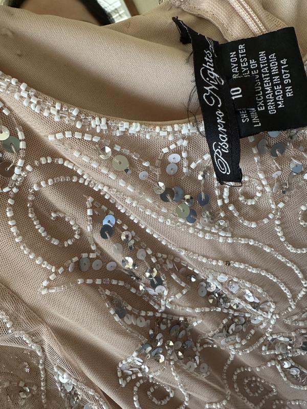 Customer photo for "Received a Used/Returned Defective Dress"
