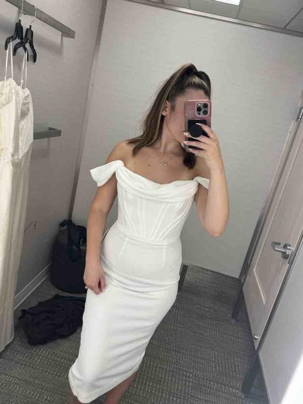 Customer photo for "Cheap material. See through. Not flattering"