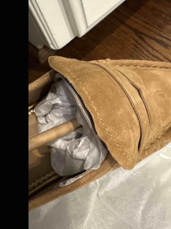 Customer photo for "tongue of shoe messed up"