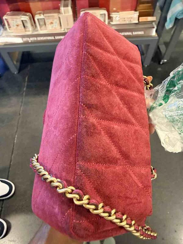 Customer photo for "Beautiful bag, disappointing condition upon pickup"