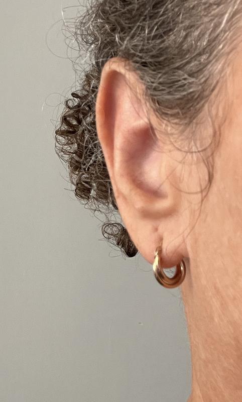Customer photo for "Perfect Tiny Twisted Hoops"
