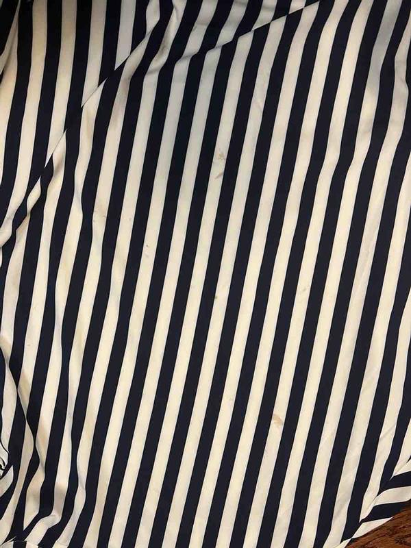 Customer photo for "Received disgusting, used, stained outfit"