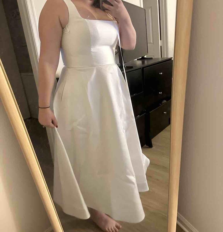 Customer photo for "Beautiful dress - order a size or two up!"