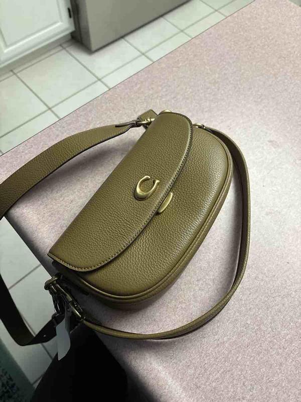 Customer photo for "color is more olive in person"