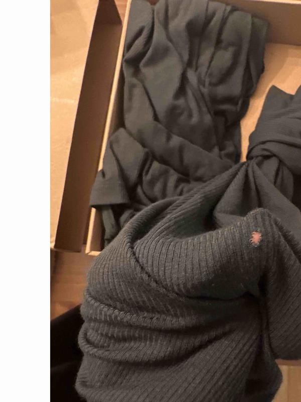 Customer photo for "came with holes in the pants"