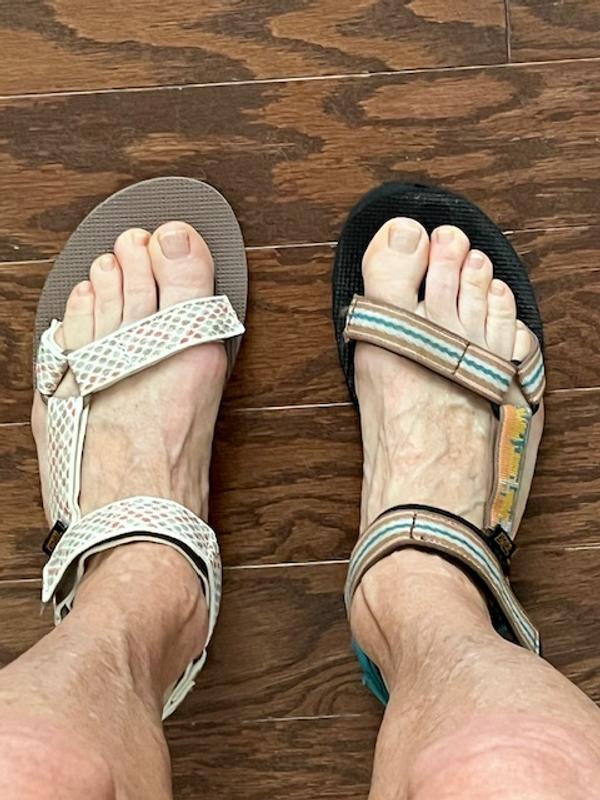 Sandal is running big, by 1/2 size