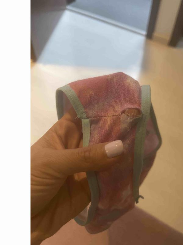 First time worn, and it has quite a big hole in it