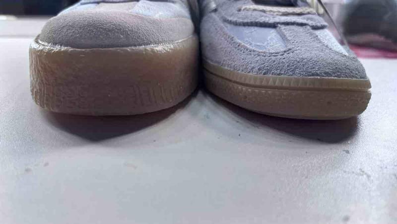 Customer photo for "Recieved 2 Different Shoes"