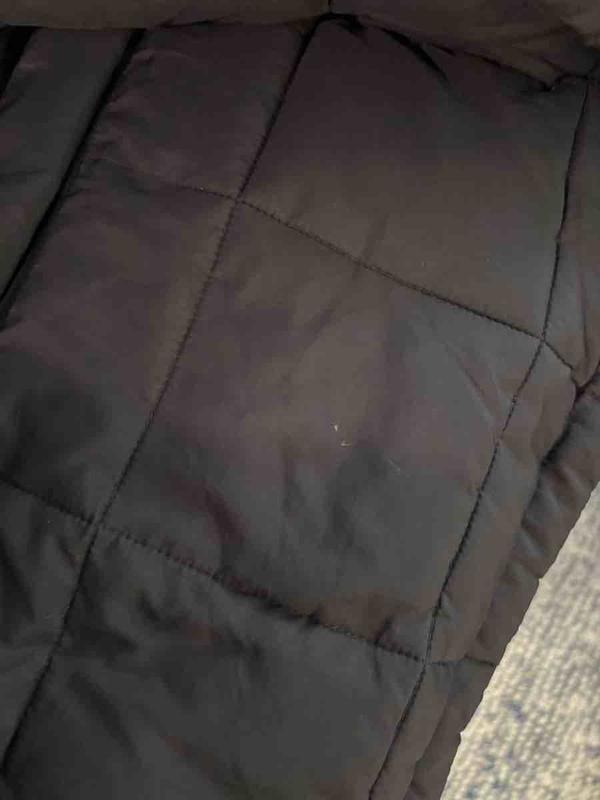Customer photo for "Sent a Damaged, Dirty and Used Jacket"