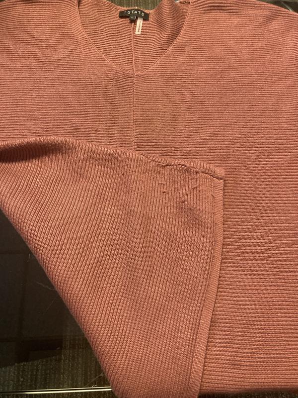 Customer photo for "Poor quality - sweater disintegrates"