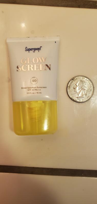Customer photo for "tiny tube and unnoticeable on skin"