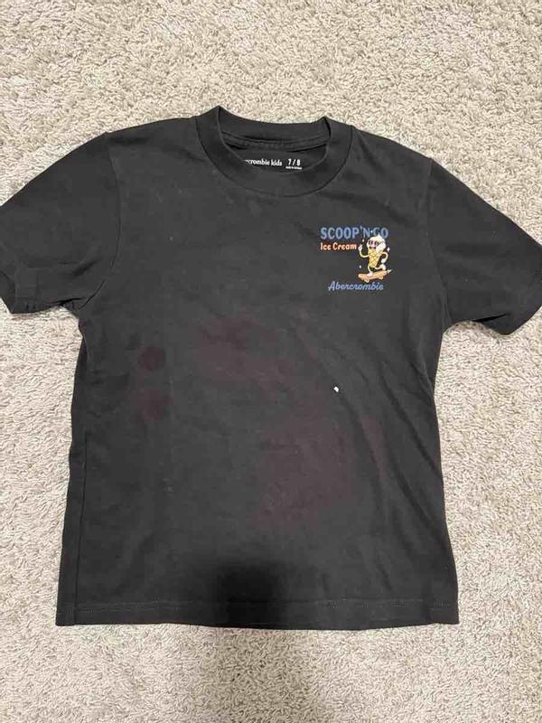 Customer photo for "received a USED shirt. also looks tiny"